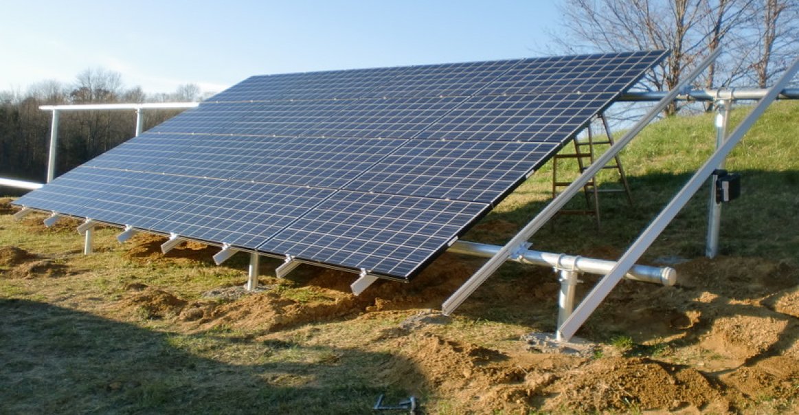 Half of the solar panels mounted on to the rails