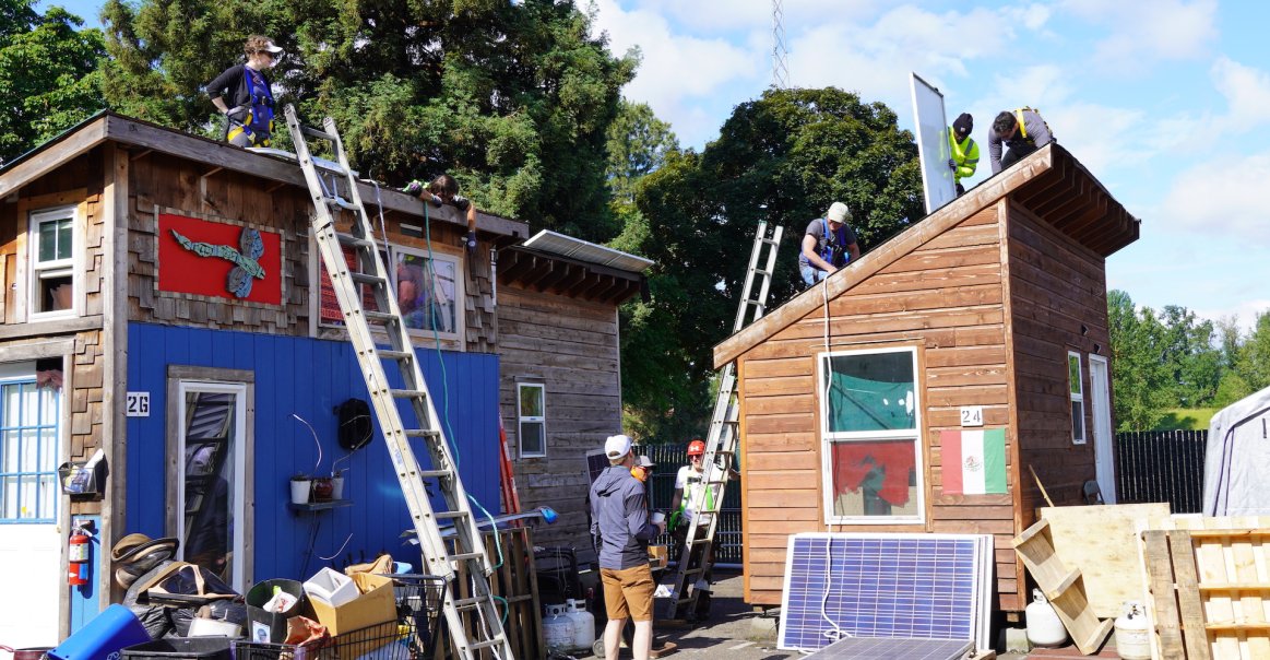 Team Working on Solar Installation